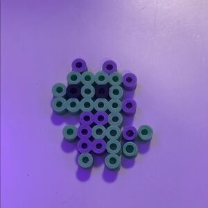 Purple and Green Beaded Craft Piece